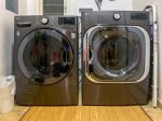 there is a large capacity LG front-load washer and dryer with steam for your laundry needs